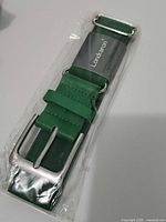 Full view of sealed green Londkaron baseball belt