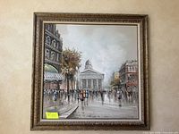Frontal view of framed painting showing entire artwork and frame