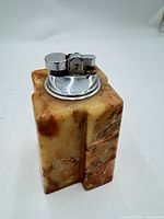 front view of stone lighter showing color and lighter insert