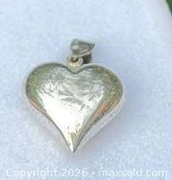 Front view of sterling silver heart pendant