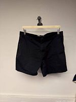 Front view of black Calvin Klein shorts