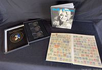 Overview showing book, cassette set opened, and stamp album