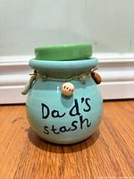 Front view showing text, color and lid