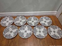 Eight plates arranged to show full lot and pattern consistency