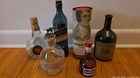 Group shot of all five bottles plus Robert Burns tube