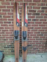Front view of both Cypress Gardens laminated wood water skis showing graphics and bindings