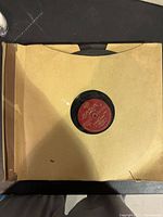London label 78 RPM record in album sleeve