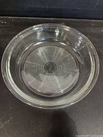 top view of clear round glass dish showing rim and interior