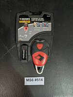 Front view of packaged Husky retractable LED light