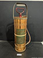Full view of LaFrance copper/brass pump-tank fire extinguisher
