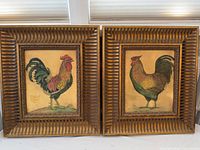 Front view of both framed rooster prints