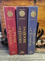 Spine view of all three Heroes of Olympus hardcovers