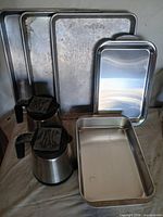 Lot overview showing all bakeware and carafes
