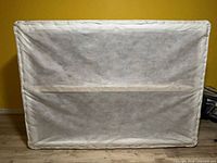 Box spring front view, white panel