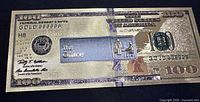 Full front view of gold-foil novelty bill