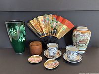 Group shot of all eight Japanese collectible items