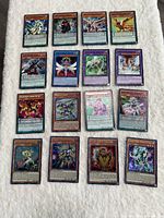Full layout of sixteen holographic cards in four-by-four grid