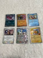 Full view of all six Pokémon cards laid out