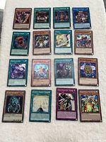 Full overhead view showing all sixteen cards laid out in four-by-four grid