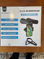 Front of retail box showing key specifications and bird photo on smartphone adapter