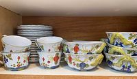 Bowls and plates on shelf