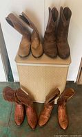 All four pairs of boots displayed together for overview