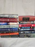 Full view of both stacks showing all 15 books