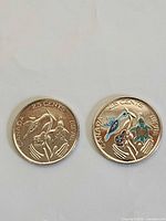 Two 2017 Hope for a Green Future quarters, colourized and non-colourized versions