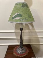 Full view of lamp with shade on table
