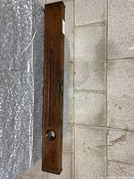 Full view of level front showing oval vial window and circular sight