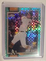 Front of Nick Kurtz Aqua X-Fractor card showing holographic finish and serial number