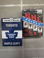 Front view of both card boxes: Maple Leafs deck and sealed NHL Hockey Aces deck