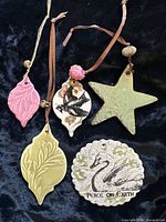 Front view of all five ceramic ornaments