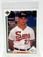 Front view of Mike Mussina Upper Deck card in top loader