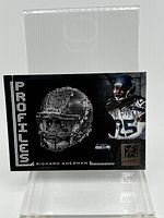 Front of Richard Sherman Panini Elite card showing graphics and player image