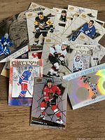 Sample spread of Tim Hortons 2026-27 Upper Deck NHL trading cards including Platinum Profiles, Above the Ice, Foil inserts