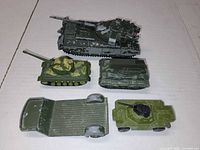 Group shot of all five military die-cast vehicles