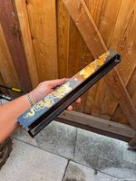 Full view of black lacquer wooden incense holder with dragon design