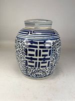 Front view showing shou character and floral pattern on ginger jar