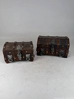 Both wooden jewelry boxes front view showing hardware