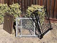 Three different style InnoTruth safety gates leaning together outdoors