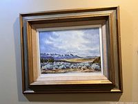Full view of framed landscape print