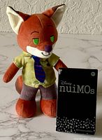 Full view of Nick Wilde nuiMOs plush with tag and backing card