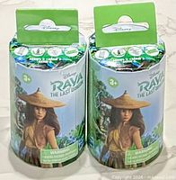 Two sealed Disney Raya Series 3 blind capsules front view