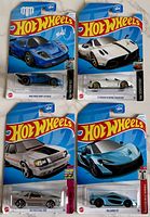 Group view of all four sealed Hot Wheels cards