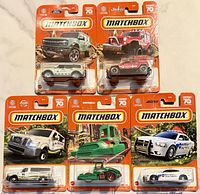 All five carded Matchbox vehicles on display