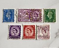 All six British stamps laid out for overview