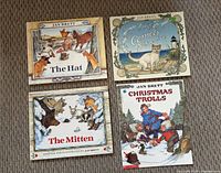 All four Jan Brett books front covers visible