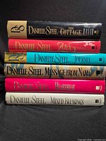 Spine view of all six Danielle Steel hardcover books