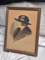 Full view of framed portrait showing composition and frame